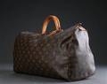 Taske Louis Vuitton. 