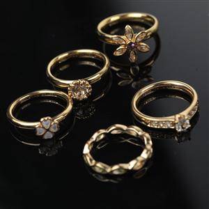 Fem ringe fra Christina watchees i forgyldt sterling sølv. 