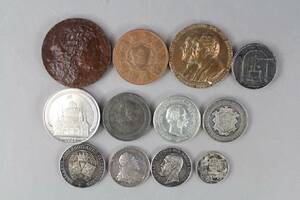 Medaljer 12 st