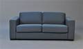 Sofa sovesofa betrukket med petroleumsfarvet møbelstof