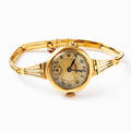 Tissot damarmbandsur i 18 k guld
