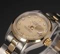 Rolex Datejust. Vintage dameur i 18 kt. guld og stål med brillantskive, ca. 1974
