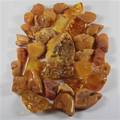 Samling Rav stykker i gule farver, ca. 382,5 gr.