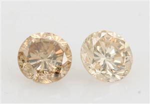 1 couple brilliant-cut light brown diamond 0.69ct