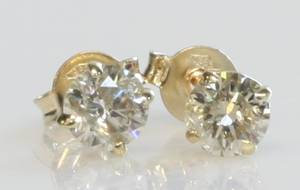 Par brillantørestikker, ca. 0.84 ct. 2