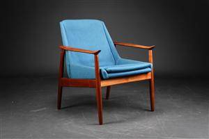 Dansk møbelproducent. Lænestol af teak