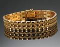 Armbånd af 18 kt guld