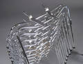 Charles  Ray Eames. Stel til skalstolen 12