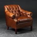 Lænestol i chesterfield-stil. 