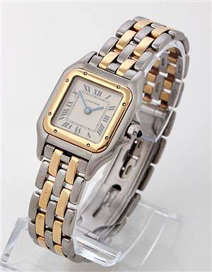 Cartier Panthere. Dameur i 18 kt. guld og stål prydet med safirer