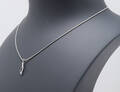 Brillantvedhæng, brillant ca. 0.006 ct. 14 kt. hvidguld, dertil en kæde af sterling sølv