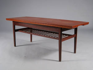 Dansk møbelproducent. Hævesænke sofabordspisebord