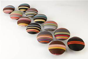 12 store knager med Paul Smith stof Ø 9,5 cm., model DOT 12 