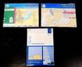 Samling søkortsmapper og havnelods komplet 