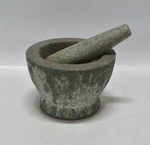 Mortel med stöt, 1900-tal, sten, H 12, ø 17 cm.