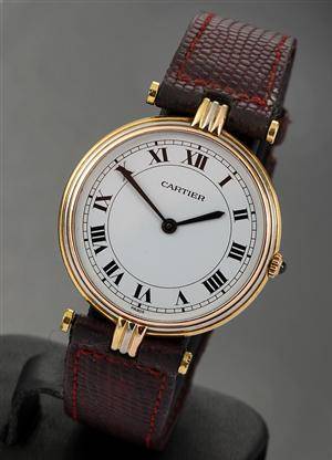 Cartier `Trinity´. Dameur i 18 kt. trefarvet guld prydet med safir