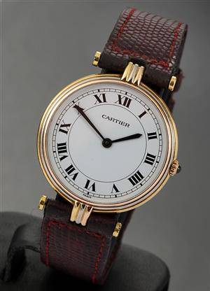 Cartier `Trinity´. Dameur i 18 kt. trefarvet guld prydet med safir 