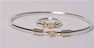 Smykkesæt af sterling sølv og 14 kt. guld - Armring samt ring 