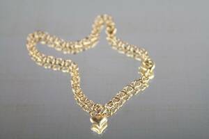 Armband i guld 18 k Bismarck med en berlock