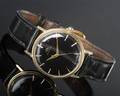 Movado, Herrenarmbanduhr - 14 kt Gelbgold
