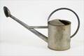 Vattenkanna med stril, Strilo, 1900-talets första hälft