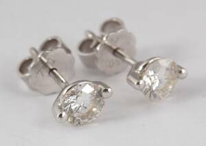 Par solitaire brillantørestikker - ca. 1.00 ct. 2