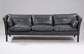 Stouby. Tre-pers. sofa, sort læder