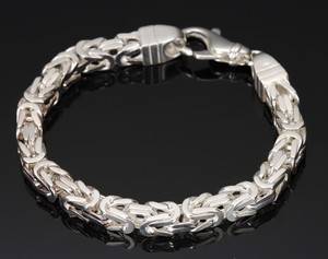 Armbånd, sterlingsølv kongemønster.