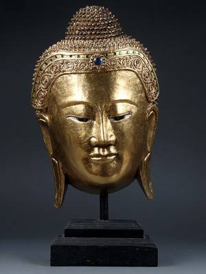 Buddhahoved af forgyldt træ