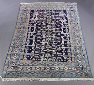 Orientalsk tæppe, uld på bomuld. 244 x 169 cm.