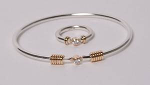 Smykkesæt af sterling sølv og 14 kt. guld - Armring samt ring 