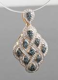 Blue treated diamond pendant in gold approx. 0.70ct.