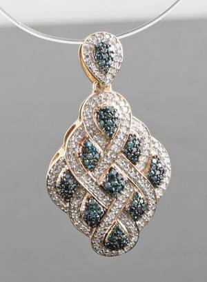 Blue treated diamond pendant in gold approx. 0.70ct.