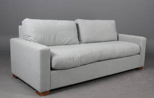 Tre personers sofa.
