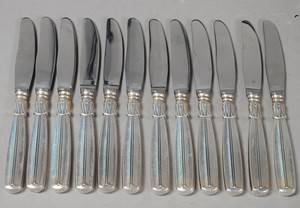 W.  S. SørensenHorsens Sølvvare. Lotus. 12 middagsknive af sølv. 12