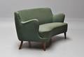 Dansk møbelproducent. Fritstående bananformet sofa 1960erne 