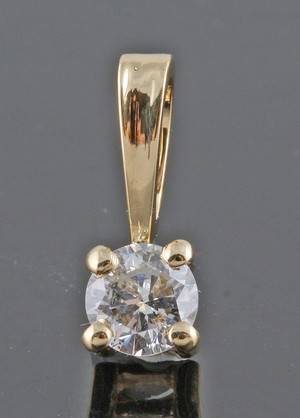 Pendant in 18k  set with brilliant cut diamond 0.17 ct