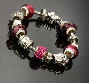 Aagaard Lovelink armbånd af sterlingsølv med 14 charms af muranoglas og sterlingsølv