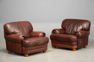 Par lænestole betrukket med brunt læder 2