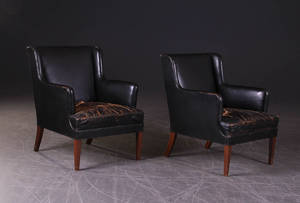 Frits Henningsen 1889 - 1965. Hvilestol med ben af mahogny