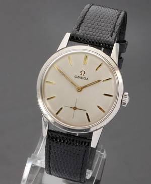 Omega. Vintage herreur i stål med satineret skive, ca. 1963