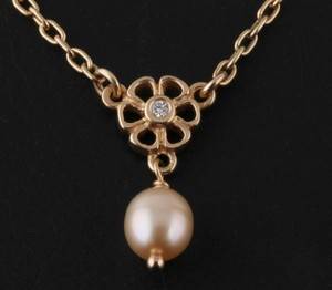 Pandora halskæde af 18 kt guld m. brilliant og perle
