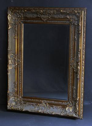 Vægsspejl med facetslebent spejlglas. 