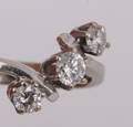 Ring af 14 kt. rhodineret guld prydet med 3 brillanter -  ca. 0.48 ct.
