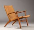Hans J. Wegner. Lænestol, model CH25 af egetræ 