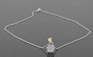 Diamond pendant in 18kt  set with diamonds 0.34 ct 