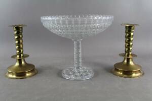 Skål på fot i glas och ljusstakar i mässing 1 par