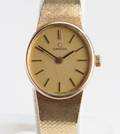 Vintage Omega, damearmbåndsur i 14 karat guld