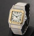 Cartier Santos Automatic. Herreur af 18 kt. guld og stål med dato