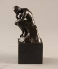 Figur forestillende Grubleren